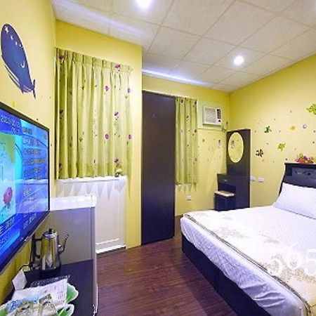 Hua Qiao De Jia Apartment Donggang Bagian luar foto