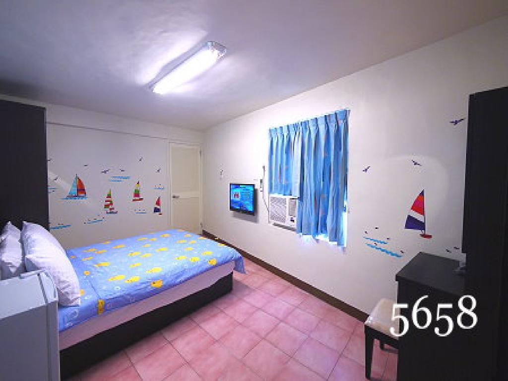 Hua Qiao De Jia Apartment Donggang Bagian luar foto